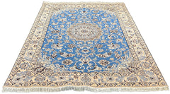 Hand-knotted Blue Nain 9-La rug in wool with silk highlights on a cotton base featuring a cream medallion on a brilliant blue field - #6389.