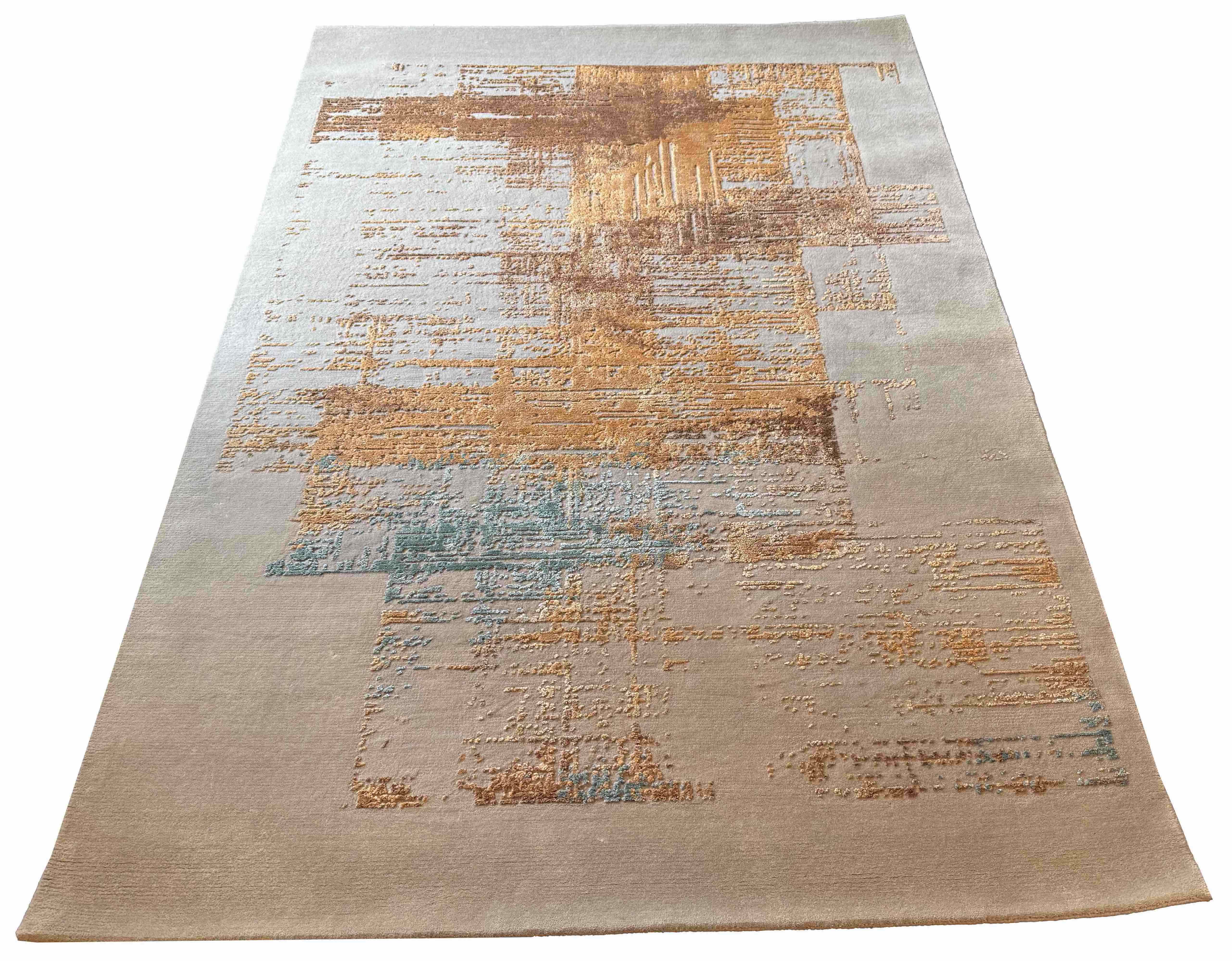 Hand-knotted modern abstract rug featuring a multi-color blend of gold, copper, and teal bamboo silk - #YM-A-104.