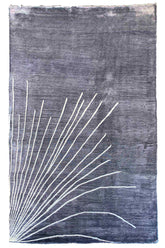 Sleek handmade modern grey rug in 100% bamboo silk with a white abstract fanned-out pattern #7975.