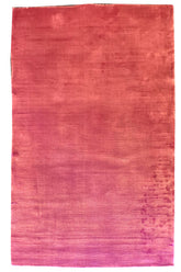 Flat lay top view of hand-knotted modern rug 7784; solid bubble gum pink in lustrous 100% bamboo silk.