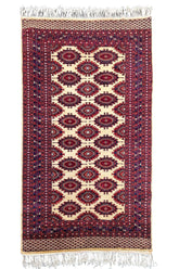 Regal hand-knotted Pakistan Sarooq rug featuring deep ruby red and indigo floral medallions on a cotton base #3387.
