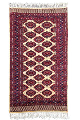 Regal hand-knotted Pakistan Sarooq rug featuring deep ruby red and indigo floral medallions on a cotton base #3387.
