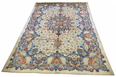 Hand-knotted Kashan rug in 100% wool on a cotton base featuring a blue and orange central medallion on a cream field - #7018.