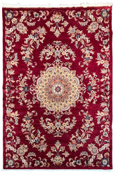 Ornate handmade Pakistan Isfahan rug with a cherry red field, cream central medallion, and floral arabesques #6513.