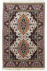 Hand-knotted Tabriz rug in 100% wool on a cotton base featuring two geometric diamond medallions on an ivory field - #7278.
