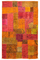 Eclectic handmade vintage patchwork rug featuring a vibrant collage of reclaimed Afghani and Persian hand-knotted textile fragments #5278.