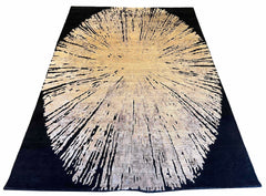 Luxury modern abstract rug featuring a large elliptical geometric sunburst in gold silk against a black wool background - #6077-CLA-111.