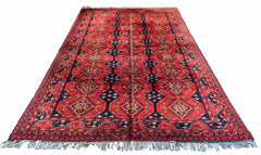 Authentic Afghani Khan Mohamadi wool on cotton base rug featuring iconic red tribal patterns - #2299.
