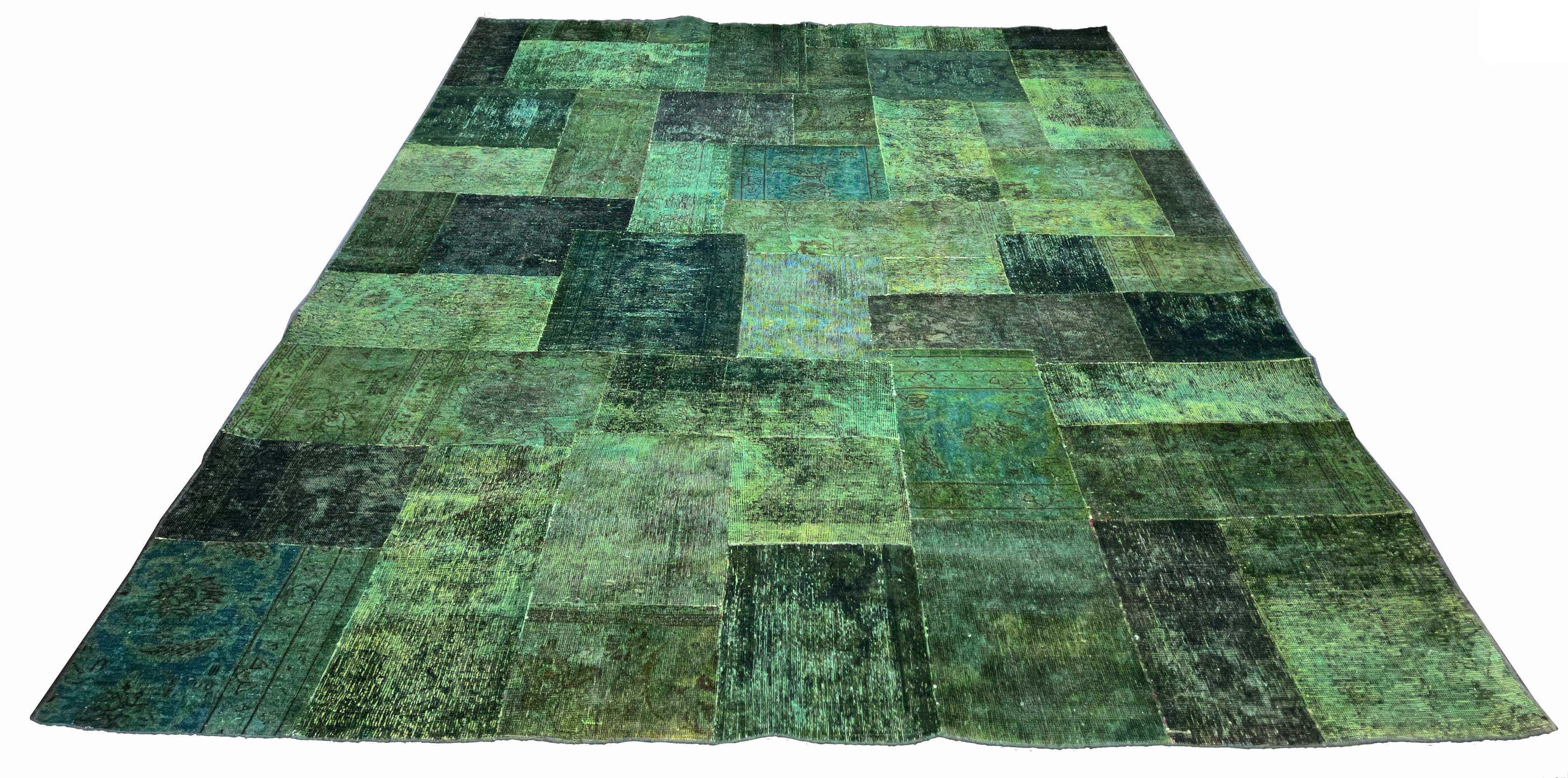 High-intent Vintage Afghani & Persian Patchwork Rug featuring a vibrant emerald and forest green tribal mosaic design - #5139.