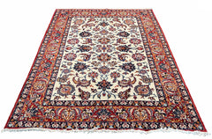 Vintage hand-knotted Isfahan rug in 100% wool on a cotton base featuring an all-over floral pattern on an ivory field - #7233.