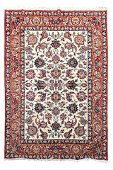Top view of hand-knotted vintage Isfahan rug 7233 featuring an all-over floral ivory field with crimson accents.