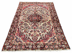 Angular perspective of hand-knotted vintage Persian Afshar rug 7577 on wool on cotton base highlighting the muted grey and brown tones and natural wool luster.