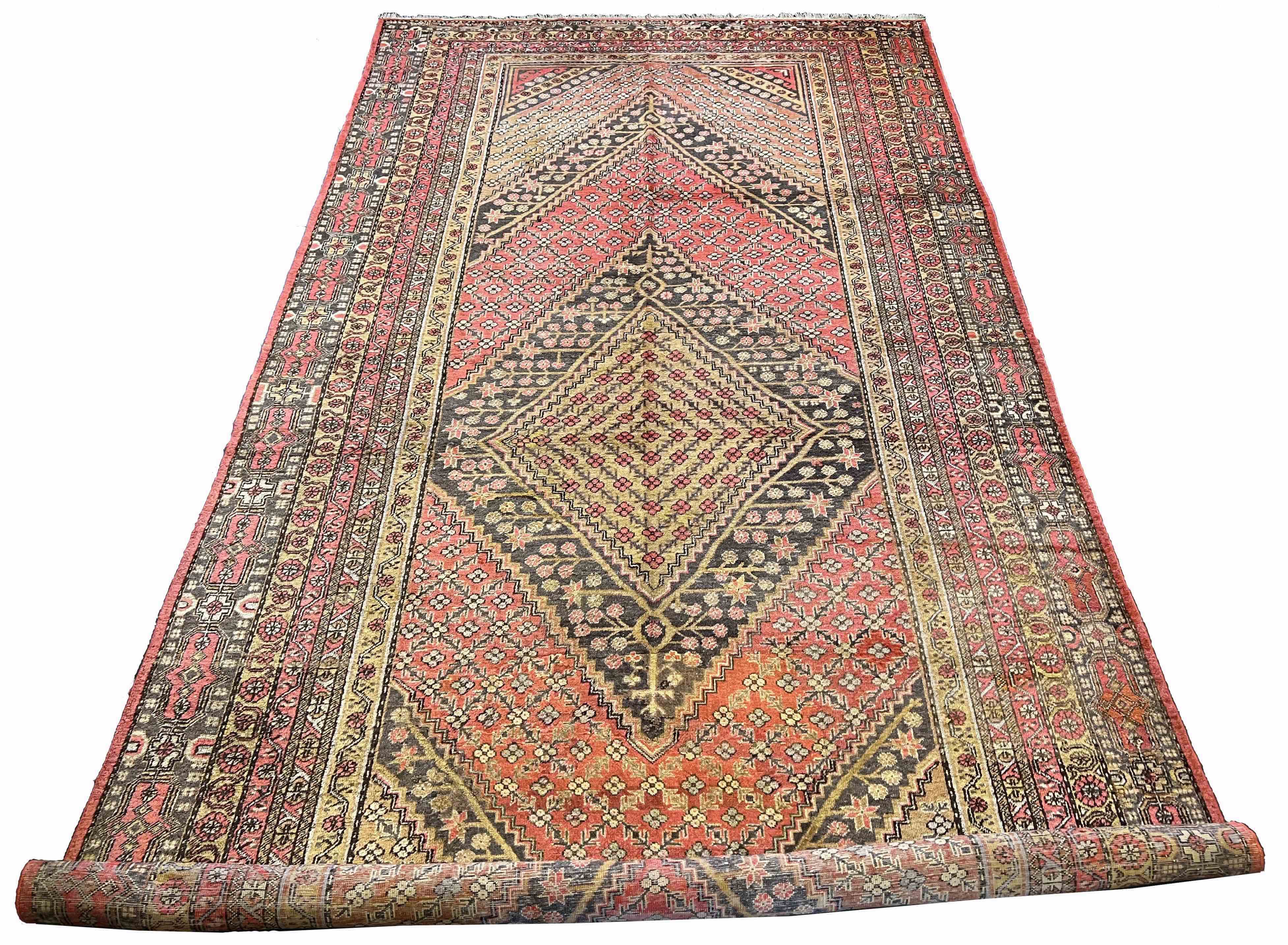 Hand-knotted antique Chinese Khotan rug featuring weathered gold and ochre botanical patterns - #440.
