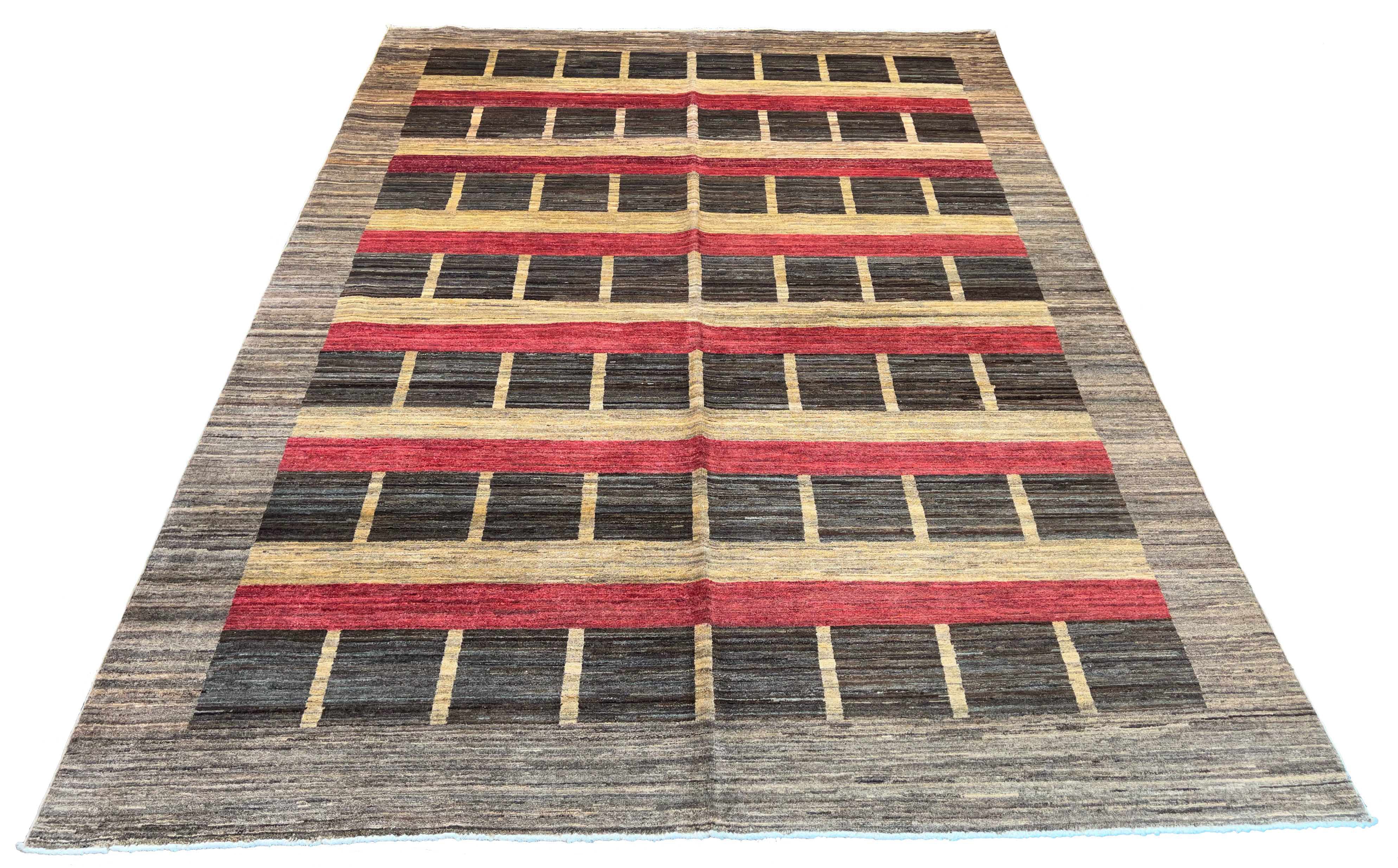 Hand-knotted #3473 Gabbeh rug with geometric tribal motifs, soft high-pile wool on a durable cotton base by AL-SHAHZADI HK LIMITED.