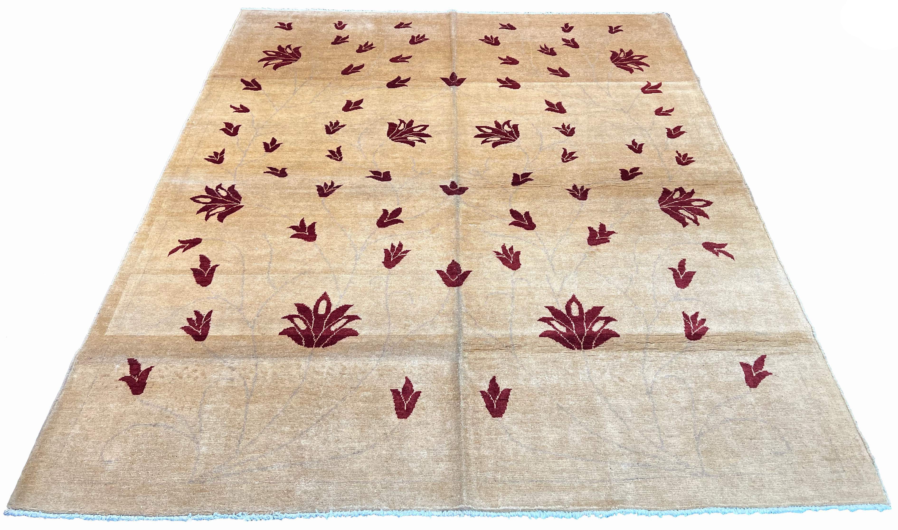 Hand-knotted floral vine Gabbeh rug with burgundy blossoms on a sand-toned wool pile and cotton foundation #2243.
