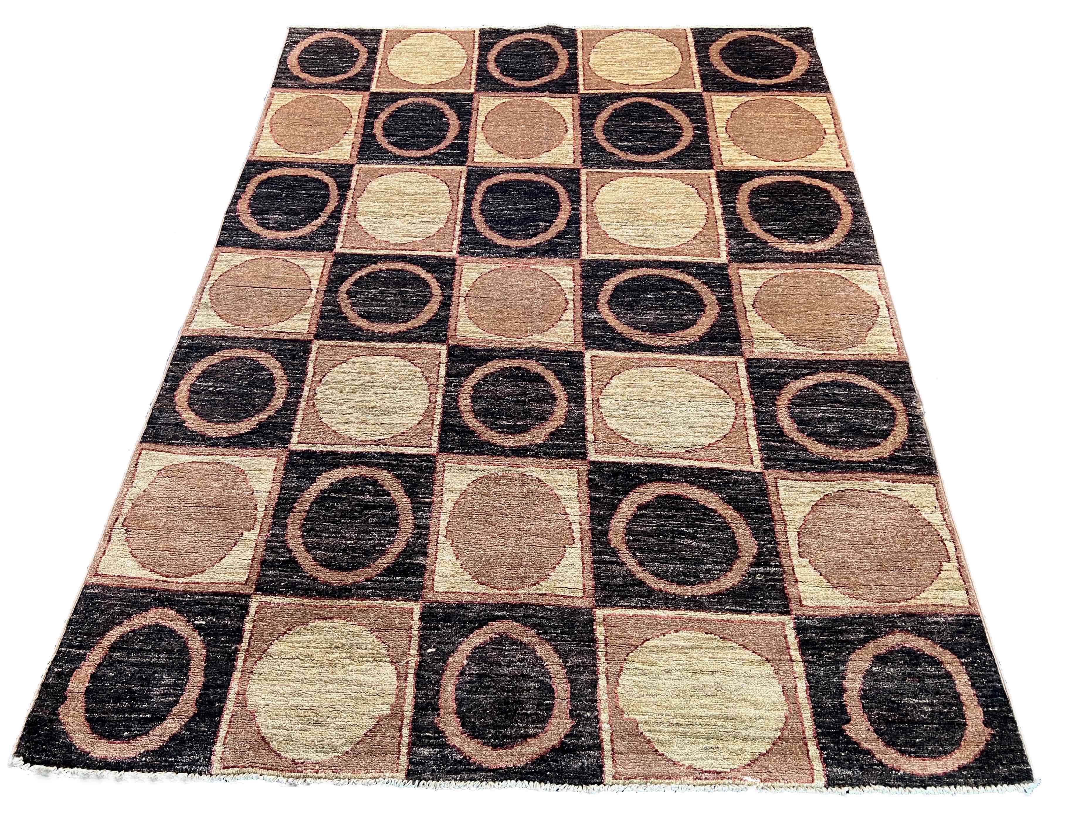 Hand-knotted geometric circular grid Gabbeh rug in cream, charcoal, and terracotta wool on a cotton foundation #3708.