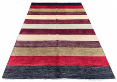 Hand-knotted multi-color horizontal stripe Gabbeh rug in burgundy, cream, and olive wool on a cotton foundation #3738.	N/A
