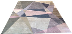 Shiny handmade modern geometric rug made of 60% bamboo silk and 40% wool with pink and purple shapes #8051.