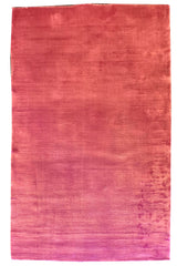 Flat lay top view of hand-knotted modern rug 7784; solid bubble gum pink in lustrous 100% bamboo silk.