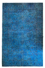 Lustrous handmade modern cerulean blue overdyed rug with a spectral floral pattern and saturated sapphire finish #6649.