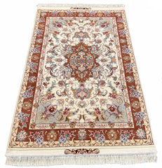 Hand-knotted Persian Beige Tabriz rug in wool on a silk foundation featuring intricate red floral motifs - #6023.