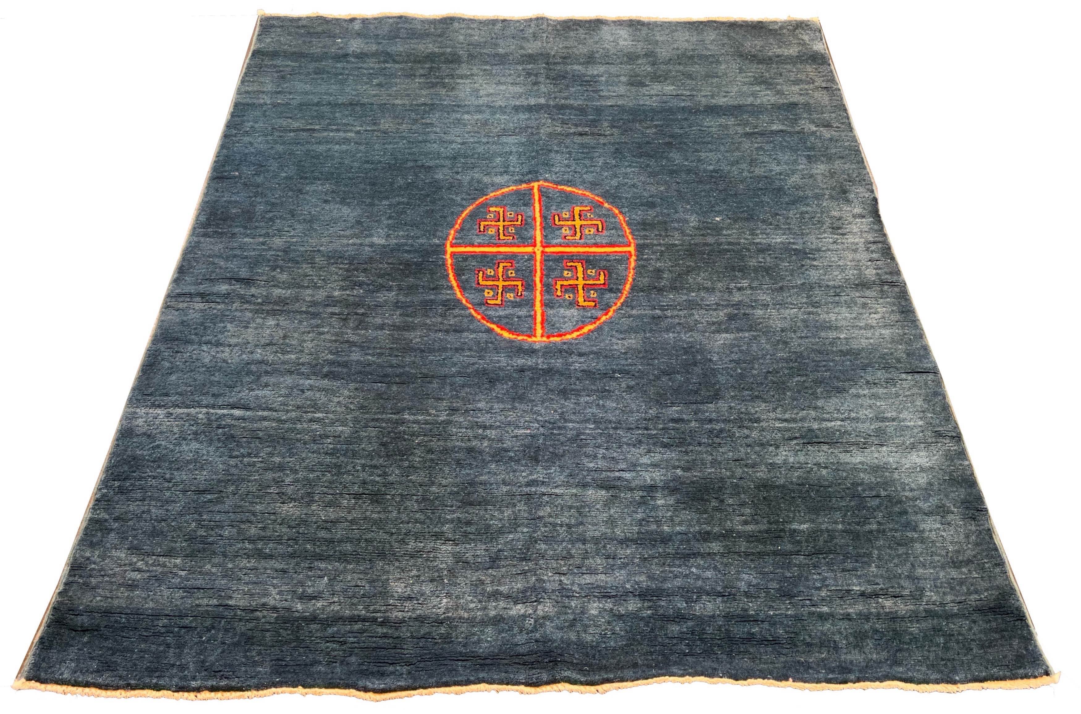 Hand-knotted Persian medallion Gabbeh rug in charcoal wool with a yellow and red sun-wheel motif #4387.