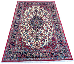 Hand-knotted Qom rug in 100% kork wool on a cotton base featuring an indigo Keshan medallion and floral vines - #8109.