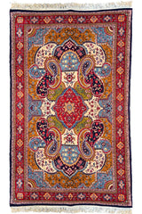 Hand-knotted Sarooq rug in 100% wool on a cotton base featuring multi-color scrolling paisley medallions and floral vines - #7568.