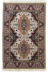 Hand-knotted Tabriz rug in 100% wool on a cotton base featuring two geometric diamond medallions on an ivory field - #7278.