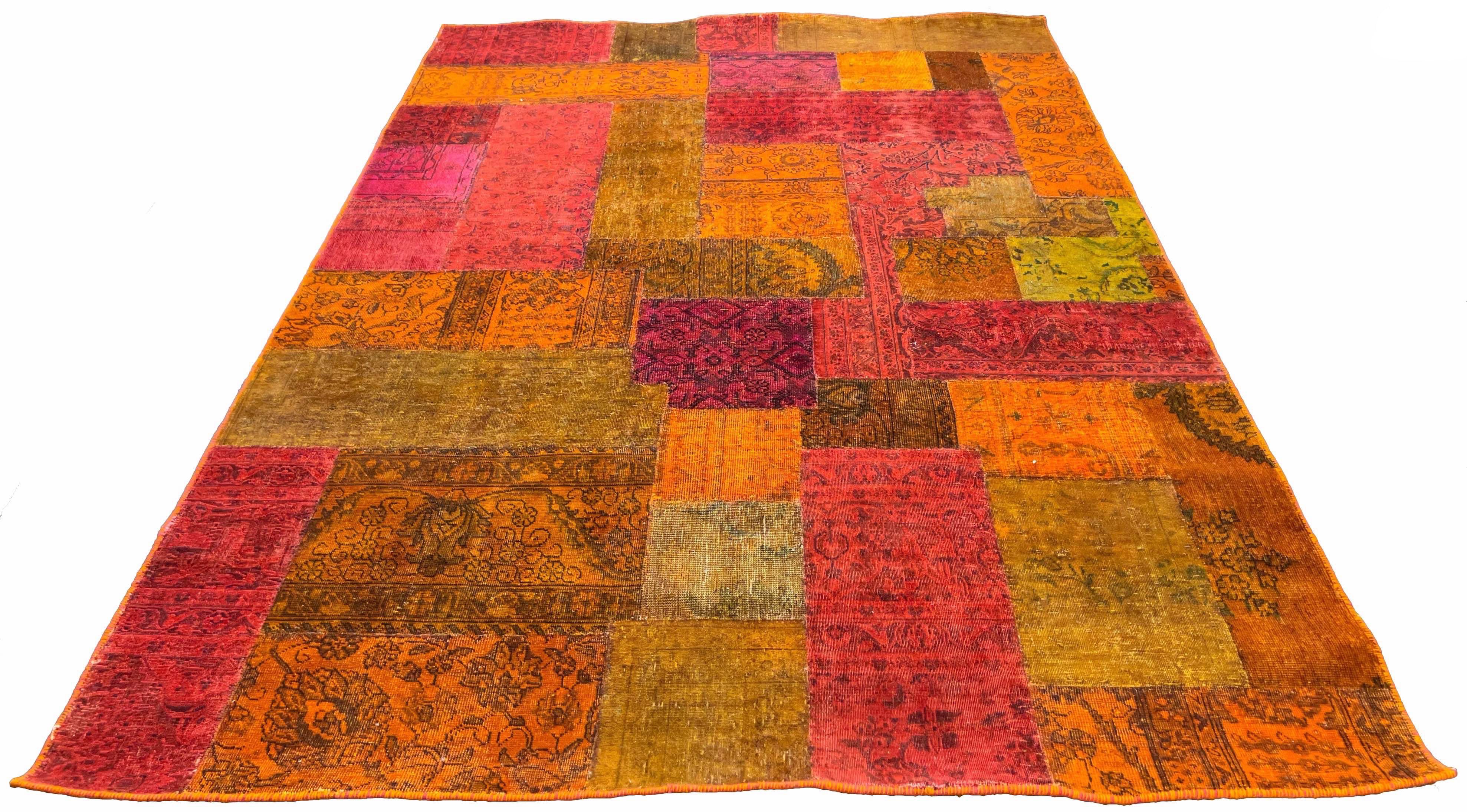 Eclectic handmade vintage patchwork rug featuring a vibrant collage of reclaimed Afghani and Persian hand-knotted textile fragments #5278.