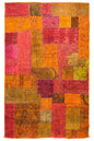 Eclectic handmade vintage patchwork rug featuring a vibrant collage of reclaimed Afghani and Persian hand-knotted textile fragments #5278.