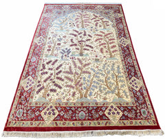 Exquisite pure silk Persian Qom rug in ivory and burgundy Tree of Life design for luxury home decor.