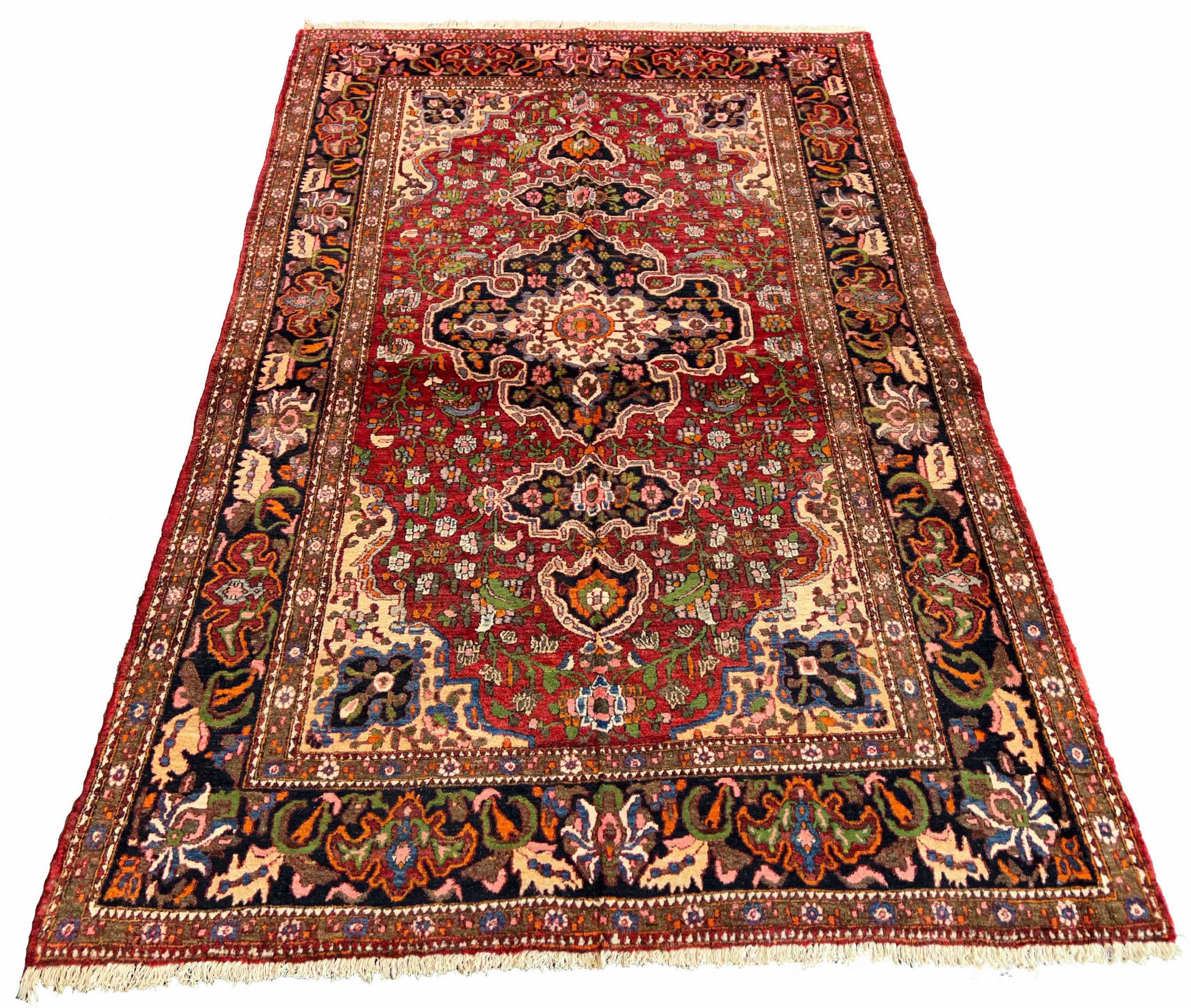 Authentic #7525 vintage Persian Bakhtiar wool on cotton base rug with central medallion and floral corners by AL-SHAHZADI HK LIMITED.