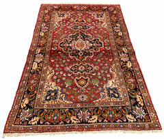 Authentic #7525 vintage Persian Bakhtiar wool on cotton base rug with central medallion and floral corners by AL-SHAHZADI HK LIMITED.